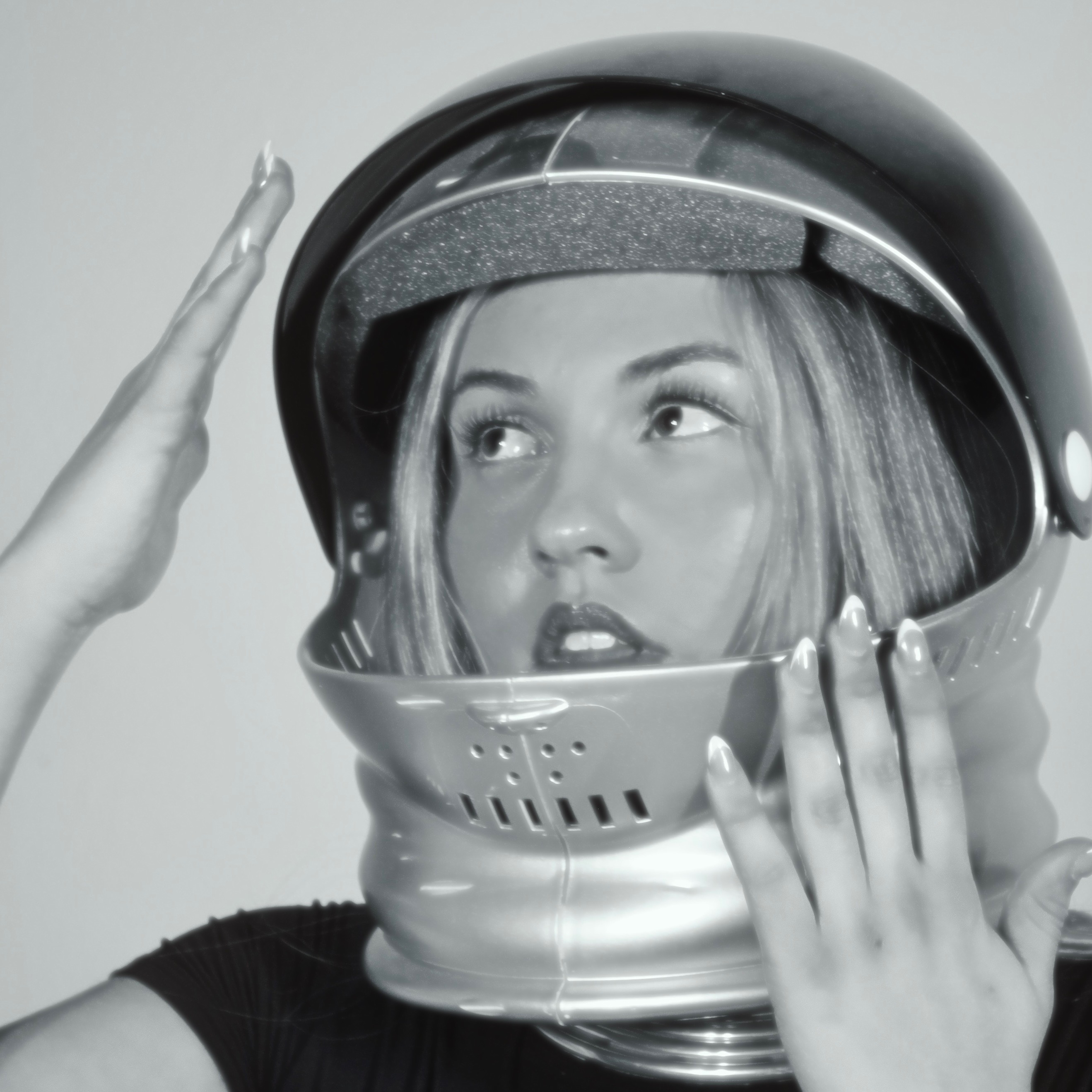 Black-and-white astronaut editorial portrait of Madelynne West